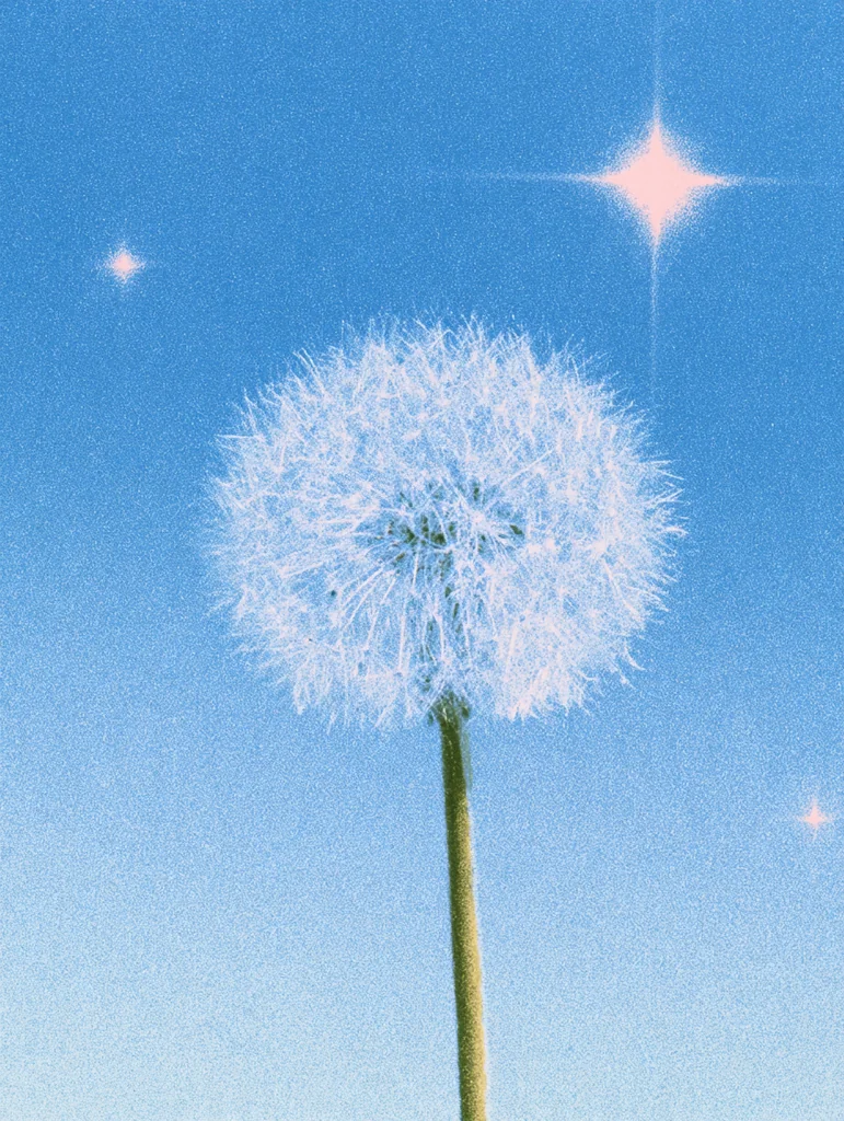 A dandelion seed head in a grainy light blue starry sky