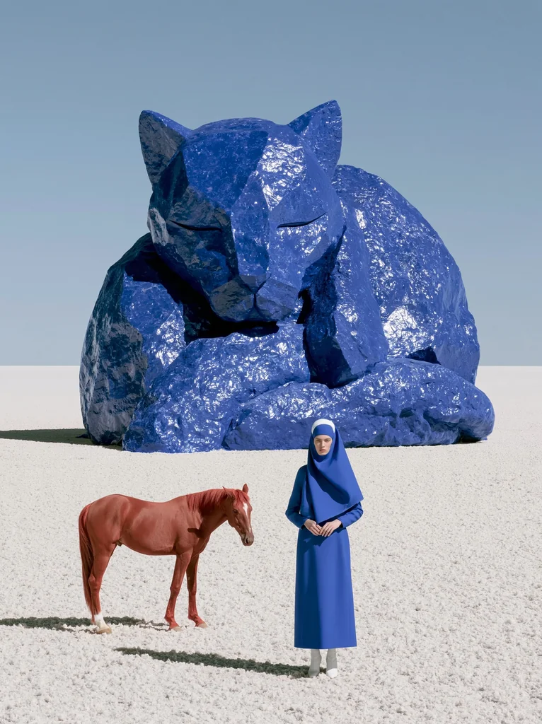 A giant sleeping cat carved from cobalt mineral in a salt desert, a figure in blue and a red horse in front