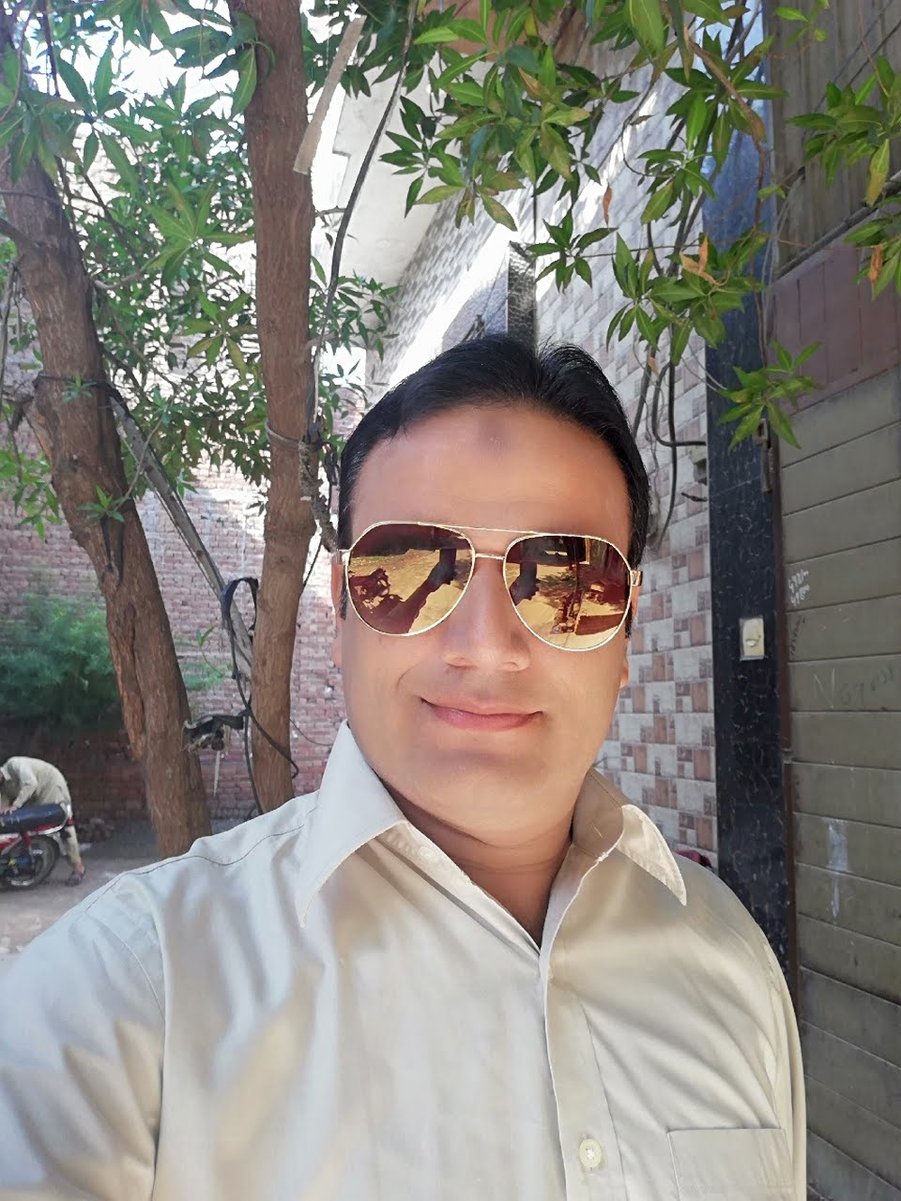 Confident Man in Sunglasses Outdoors