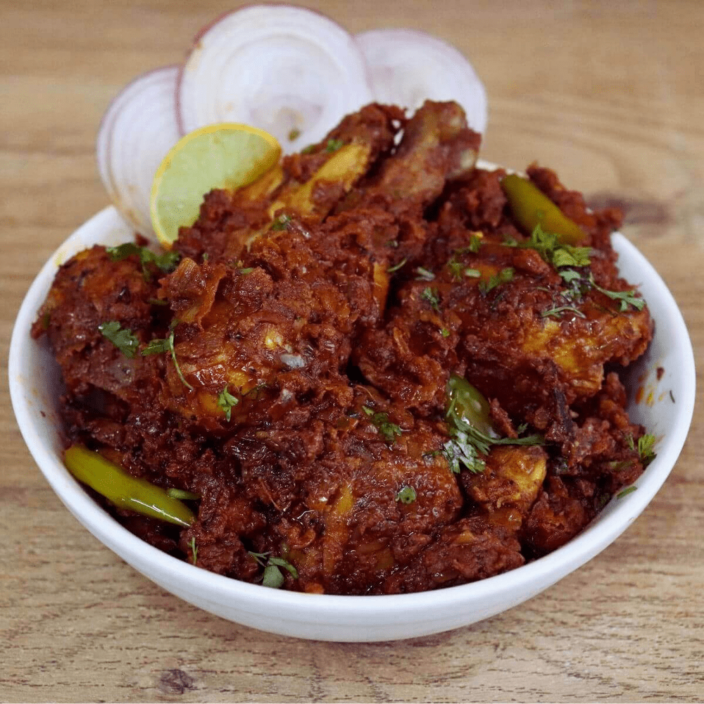 Spicy Indian Chicken Curry with Onions and Lime