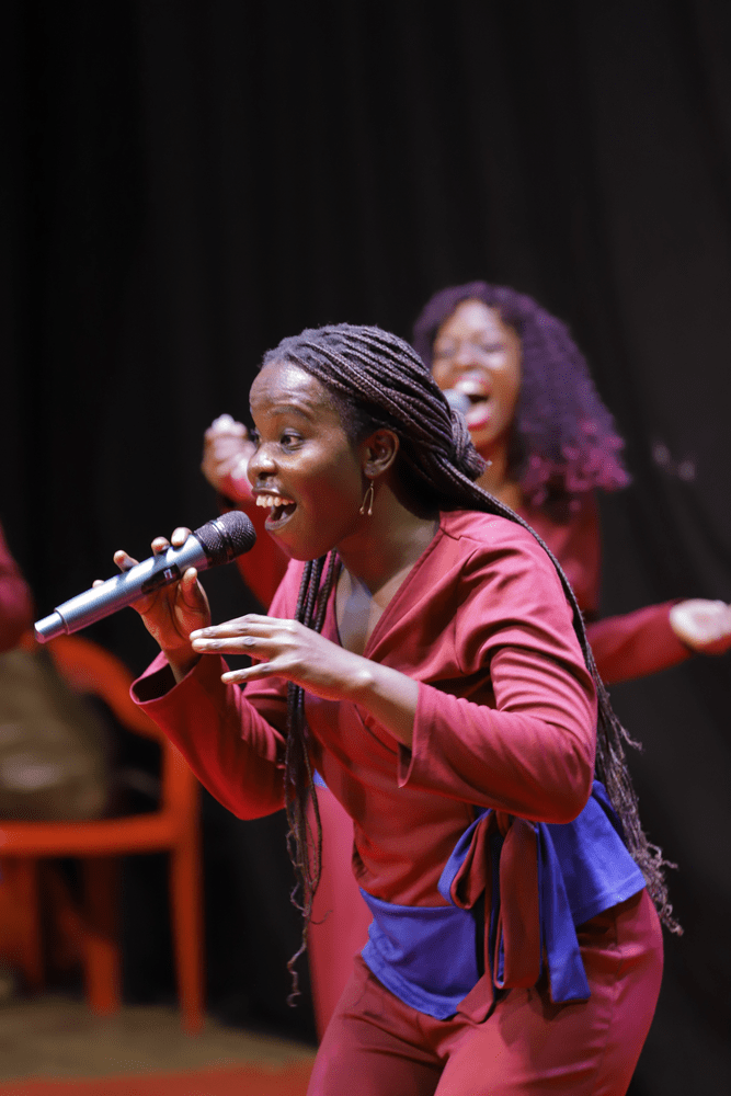 Dynamic Female Vocalist Performing on Stage