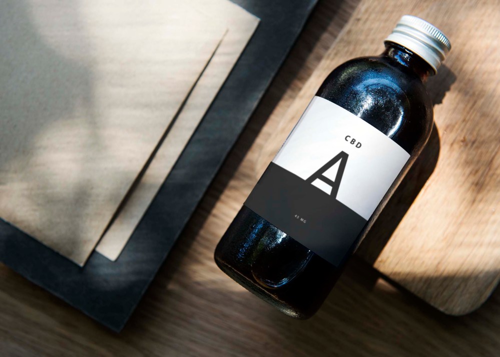 Free Cough Syrup Bottle Mockup - Graphicfolks