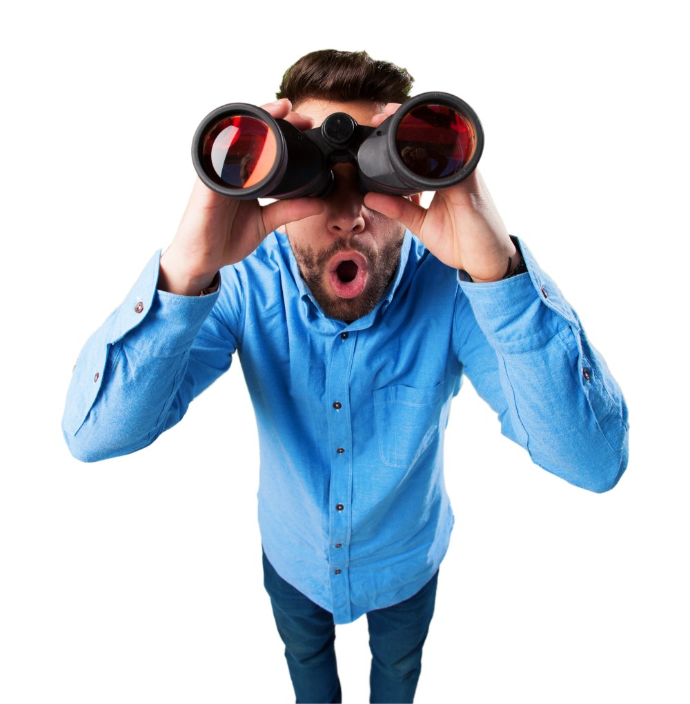Suprised man with binoculars