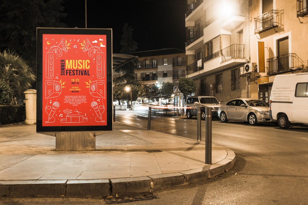 Billboard mockup in city at night