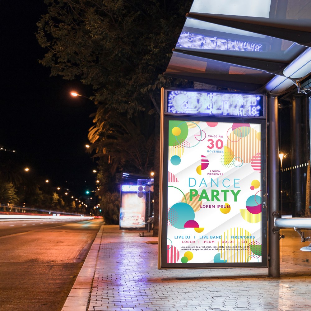 Bus stop billboard mockup in city at night