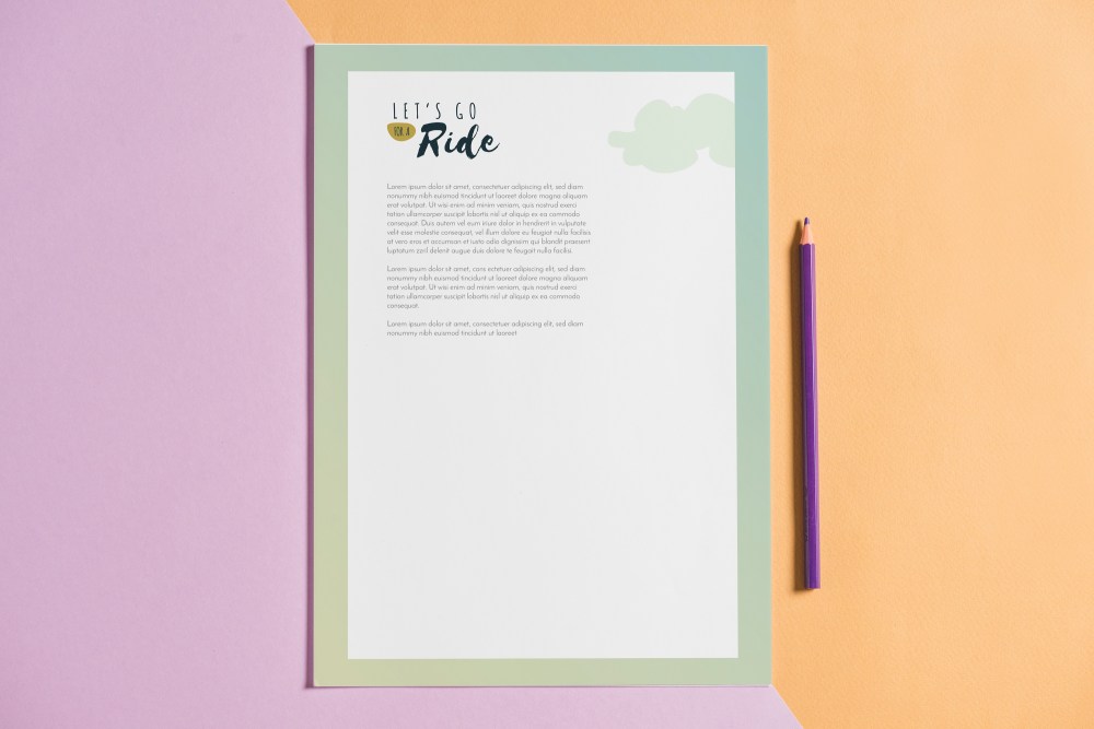 Letterhead mockup next to pen