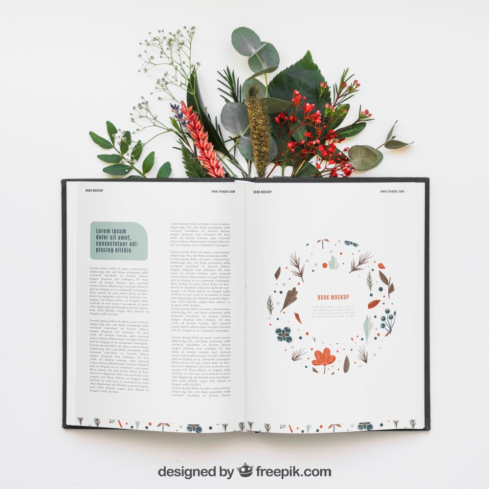 Open book mockup with leaves