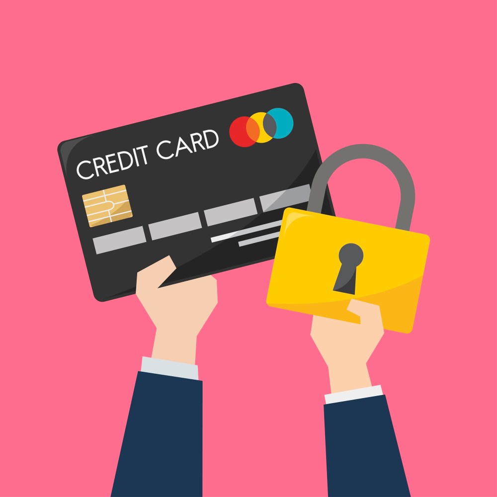 Businessman with credit card and protection