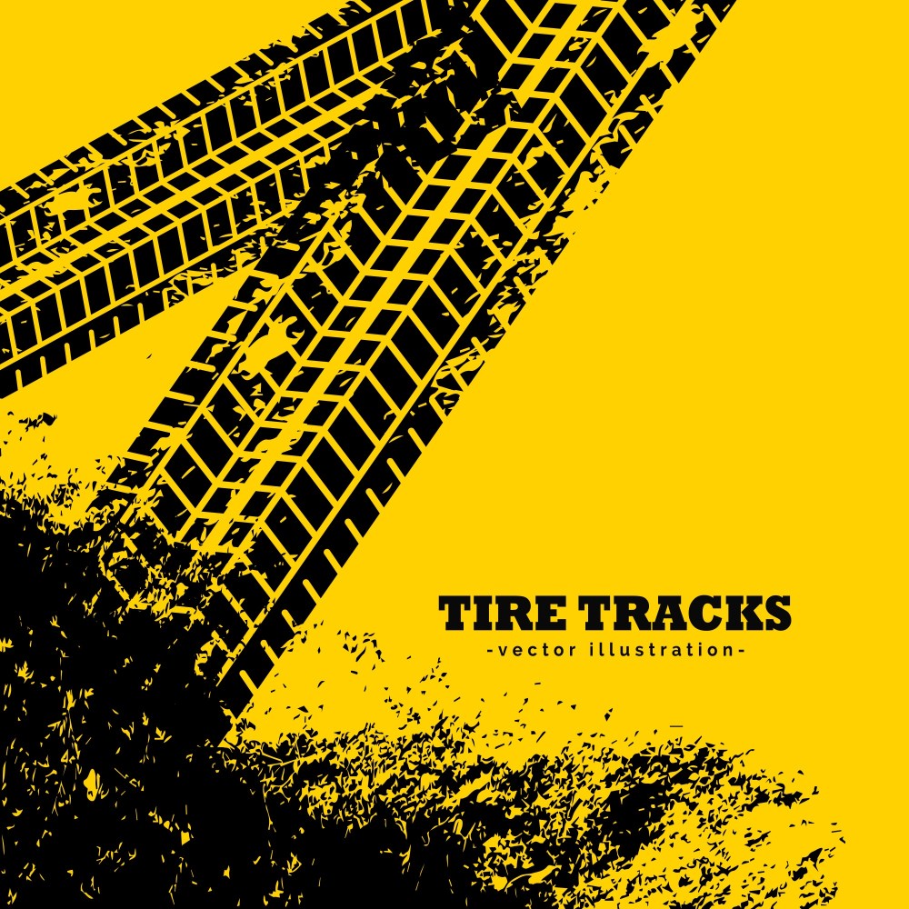 Tire tracks on grunge yellow background