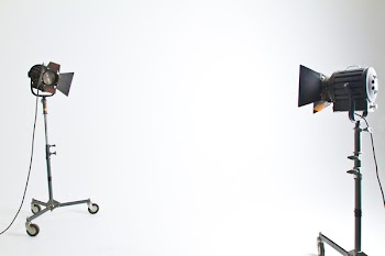 2 Black and Brown Studio Lighting in White Room
