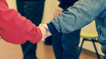 2 Persons Holding Their Hands