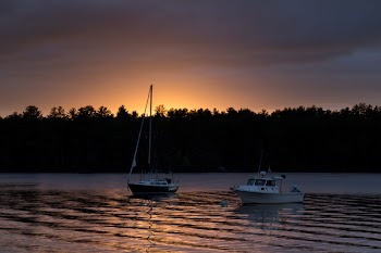 2 Speed Boat on Body of Water during Sunrise