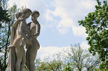 3 Human Gray Statue Surrounded by Green Trees during Daytime