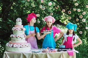 3 Person's Preparing the Cake and the Cup Cakes