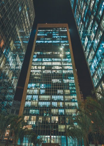 3 Tall Buildings At Night Time