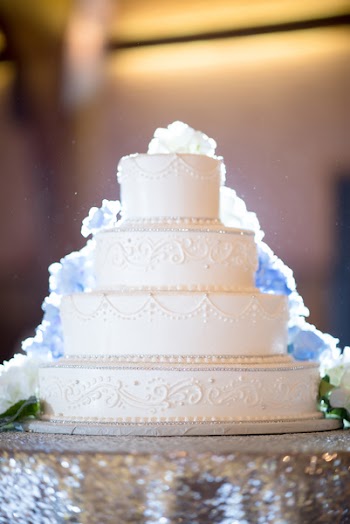 4 Tier White Icing Covered Cake