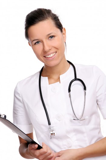 A beautiful and young doctor on white Free Photo