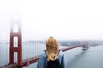 A blonde woman with a backpack | Free Photo - rawpixel