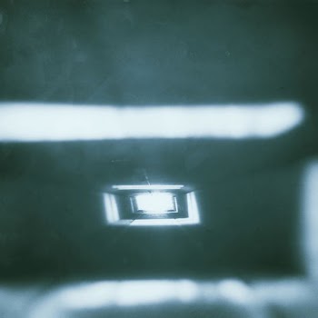 A bright light at the end of a white tunnel