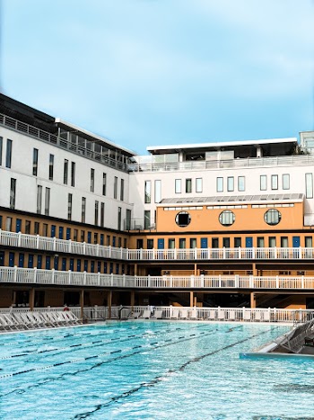 A building next to a swimming pool