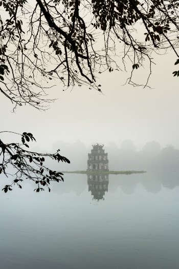 A Castle In An Island On A Lake