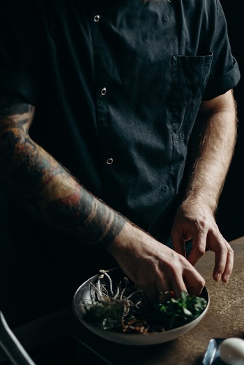 A Chef Preparing A Dish