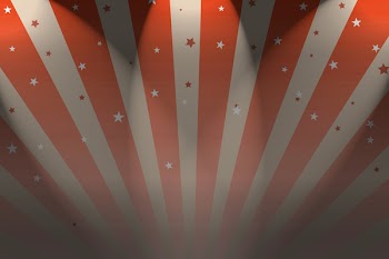 A Circus Big top style background with spotlights.