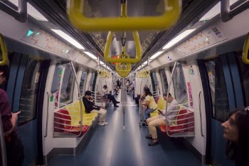 A clean and fresh MRT train carriage in Singapore.