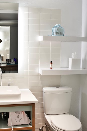 A Clean White Tiled Bathroom