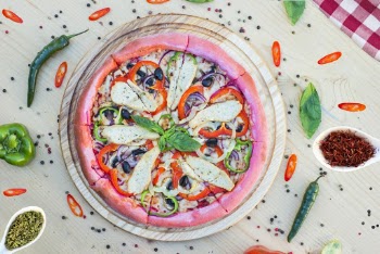 A Colorful Sliced Pizza