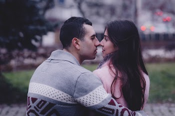 A couple about to kiss