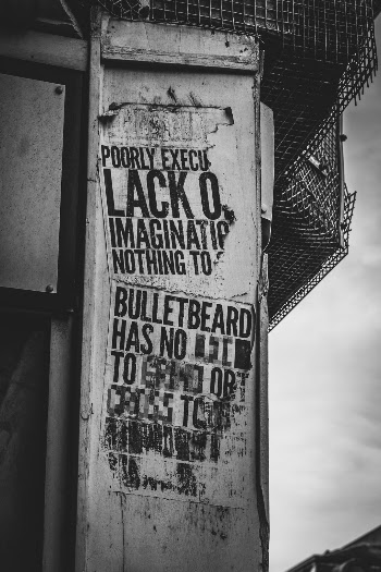 A couple of posters by Glasgow street artist Bulletbeard, don't see as much of their work as I used to. This one has seen better days, still mostly legible and the ageing adds to the character.