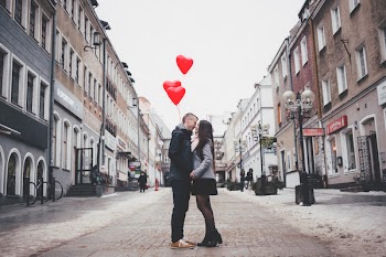 A couple with heart shape baloons 2