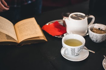 A cup of tea with a book 