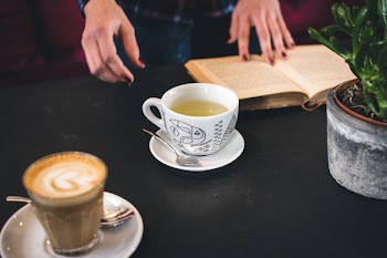 A cup of tea with a book 