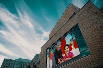 A Giant Screen On A Building Wall