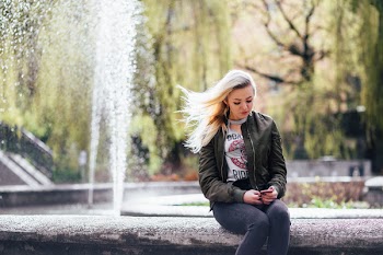 A girl at a fountain