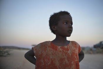 A girl stands in an | Free Photo - rawpixel