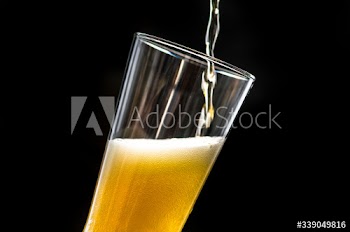 A glass of cold beer macro photography