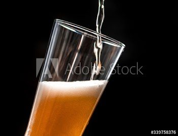 A glass of cold beer macro photography