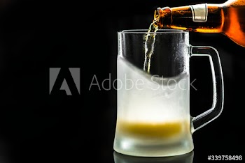 A glass of cold beer macro photography