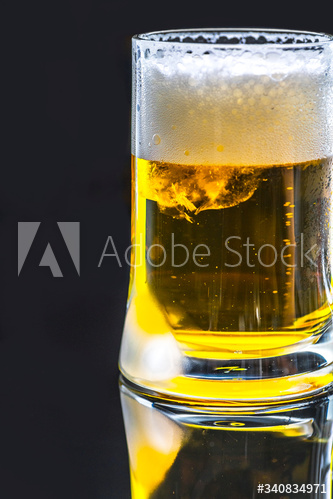 A glass of cold beer macro photography