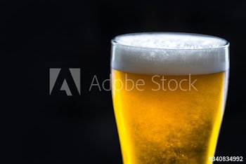 A glass of cold beer macro photography