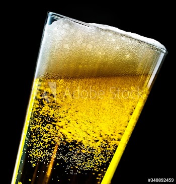 A glass of cold beer macro photography
