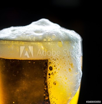 A glass of cold beer macro photography