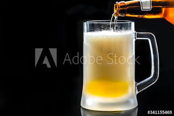 A glass of cold beer macro photography