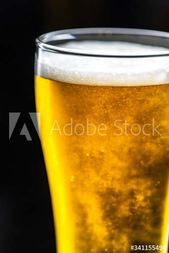 A glass of cold beer macro photography