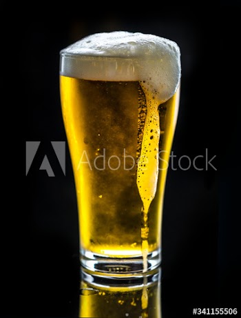 A glass of cold beer macro photography