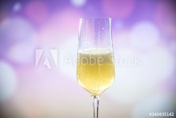 A glass of sparkling wine