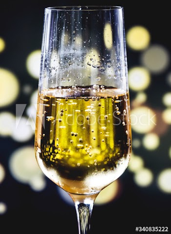 A glass of sparkling wine